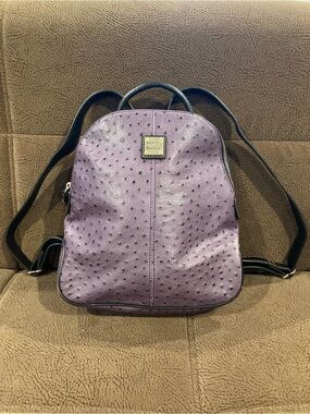 Dooney & Bourke Purple Ostrich Embossed Leather Backpack Gold tone plaque
